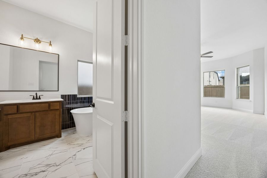 Furnished interior view inside a new home in Country Lakes, Denton (Image 14).