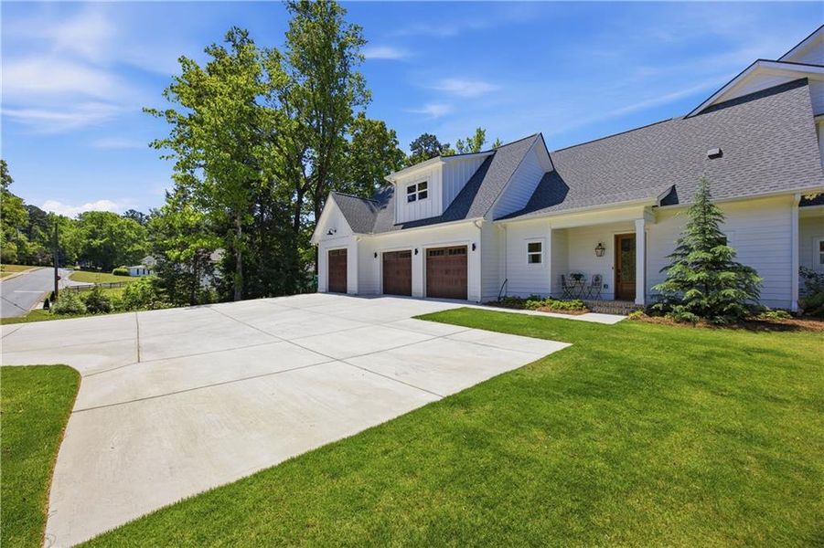 Front exterior of a new home in , Sugar Hill, GA, highlighting curb appeal (Image 26).