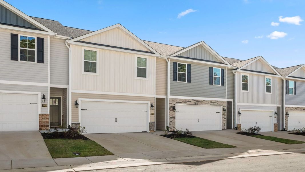Front exterior of a new home in Brightwood Farm, Whitsett, NC, highlighting curb appeal (Image 16). Front exterior of a new home in Brightwood Farm, Whitsett, NC, highlighting curb appeal (Image 16).