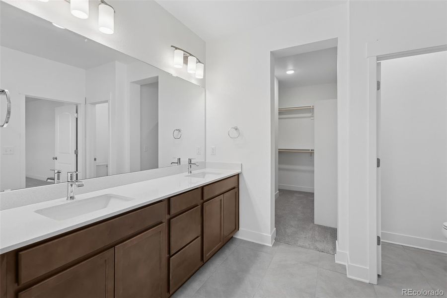 Furnished interior view inside a new home in Painted Prairie Cottage, Aurora (Image 16).
