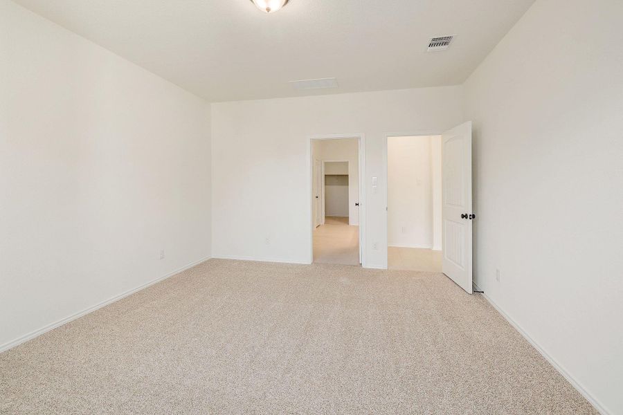 Spacious, unfurnished interior of a new home in River Bluff, Leander (Image 18).