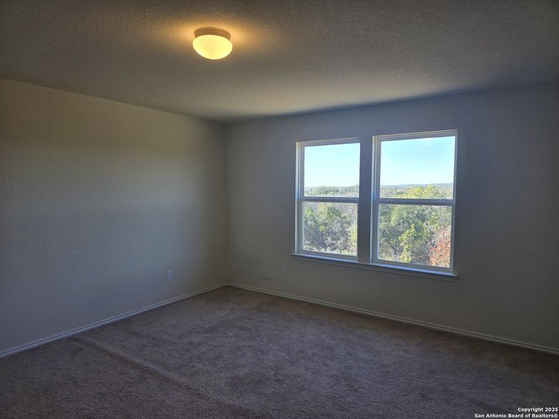 Spacious, unfurnished interior of a new home in Davis Ranch, San Antonio (Image 17).