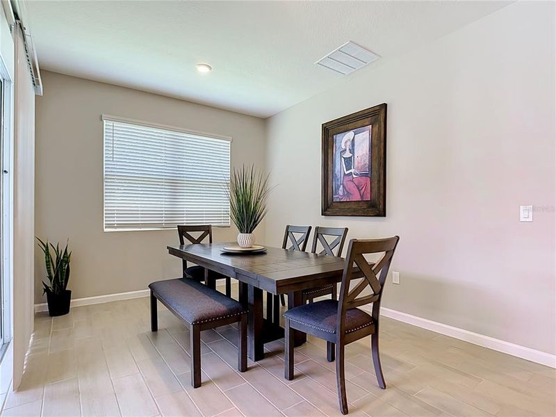 Furnished interior view inside a new home in Seasons at Big Sky, Kissimmee (Image 12).