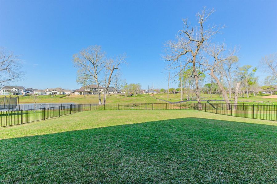 Backs directly to serene pond views with no rear neighbors offering ultimate privacy and tranquility.