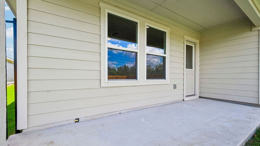 Exterior details and patio area of a home in Trails at Wildhorse, Austin (Image 24).