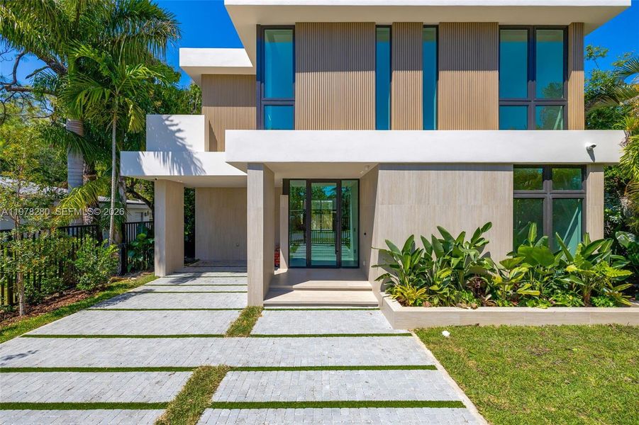 Front exterior of a new home in , Miami, FL, highlighting curb appeal (Image 18).