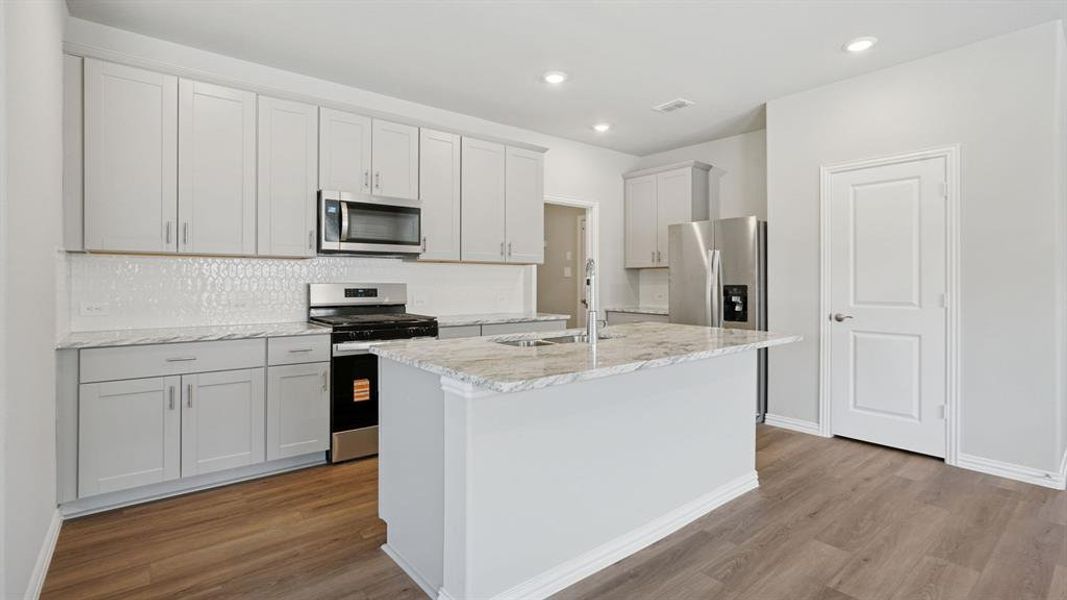 Photo is not of the actual home, but is an inspirational photo of builder’s model home and may depict options, furnishings, and/or decorator features that are not included.