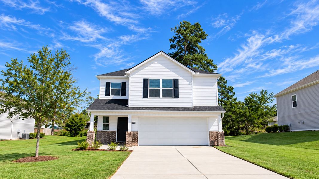 Front exterior of a new home in Evergreen Landing, Rossville, GA, highlighting curb appeal (Image 20). Front exterior of a new home in Evergreen Landing, Rossville, GA, highlighting curb appeal (Image 20).