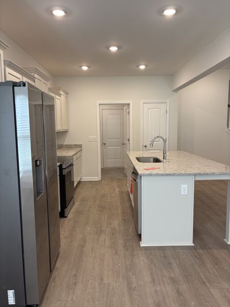 Furnished interior view inside a new home in Woodruff Cove, Murfreesboro (Image 7).