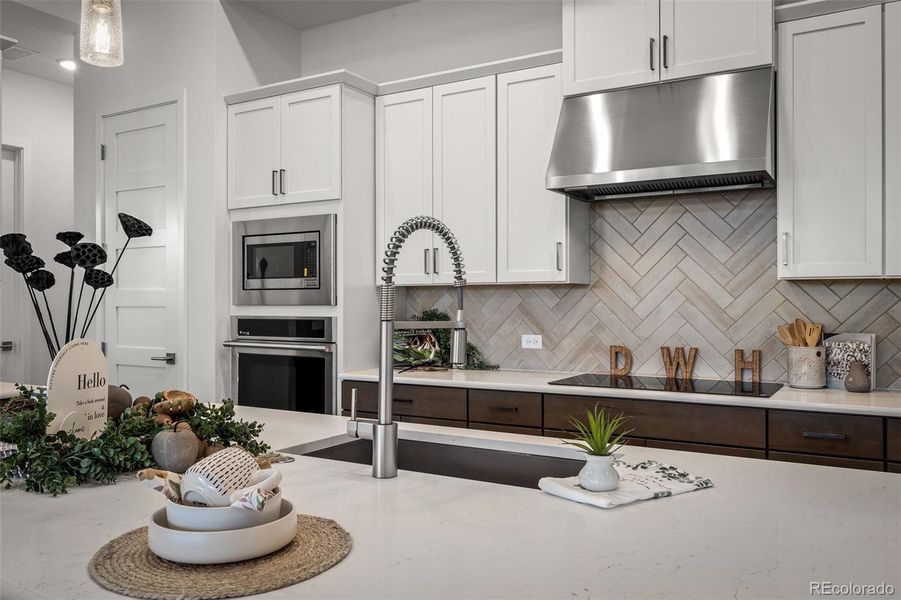 Furnished interior view inside a new home in Cloverleaf - Pinnacle Collection, Monument (Image 36).