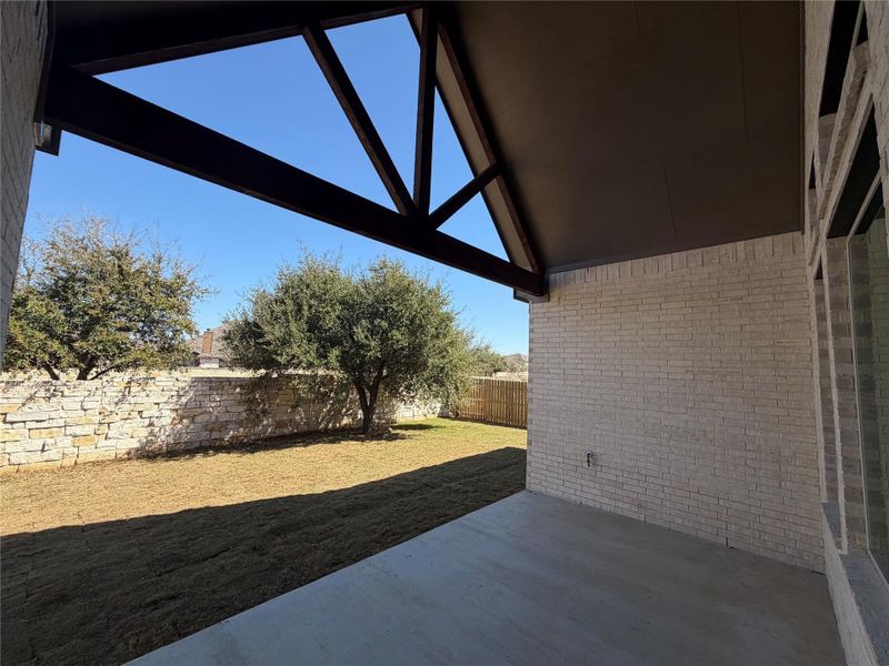 Exterior details and patio area of a home in Oaks at San Gabriel, Georgetown (Image 4).