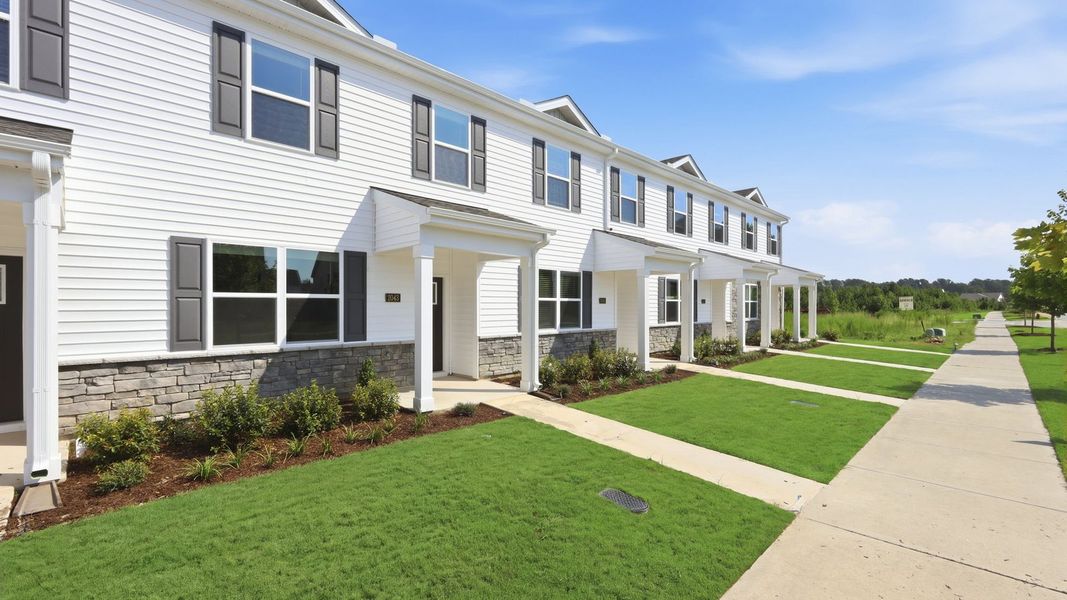 Front exterior of a new home in Clock Road Townhomes, New Bern, NC, highlighting curb appeal (Image 20).