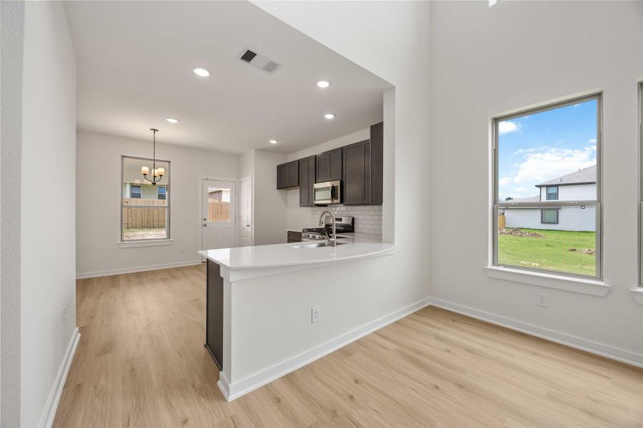 Furnished interior view inside a new home in Lexington Heights, Willis (Image 7).