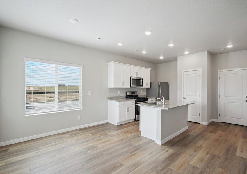 The family room is spacious and open to the kitchen.