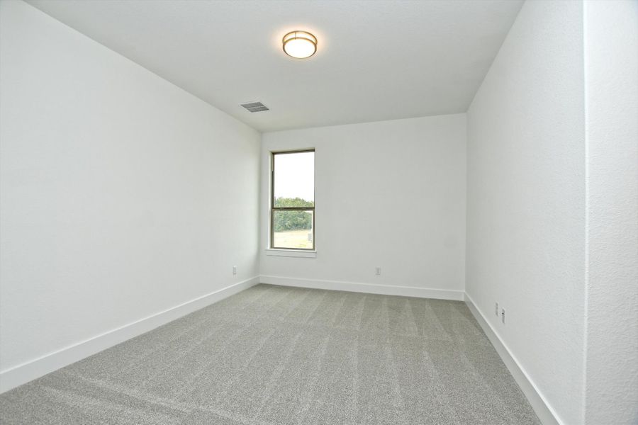 Representative unfurnished interior of a home built from the Madera II by Giddens Homes in Scofield Farms Estates, Georgetown (Image 449).