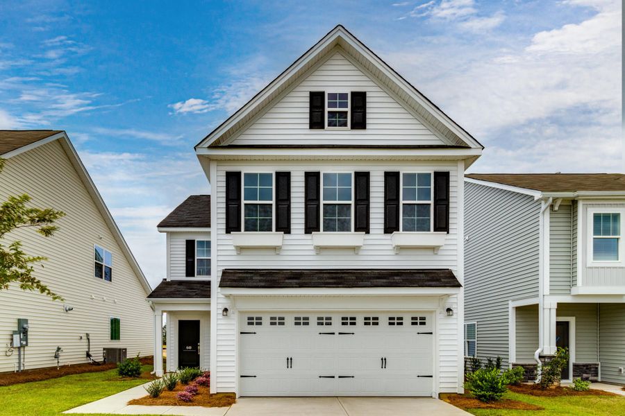 Front exterior of a new home in , Summerville, SC, highlighting curb appeal (Image 1).