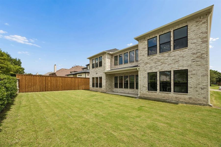 Exterior details and patio area of a home in , Frisco (Image 3). Exterior details and patio area of a home in , Frisco (Image 3).