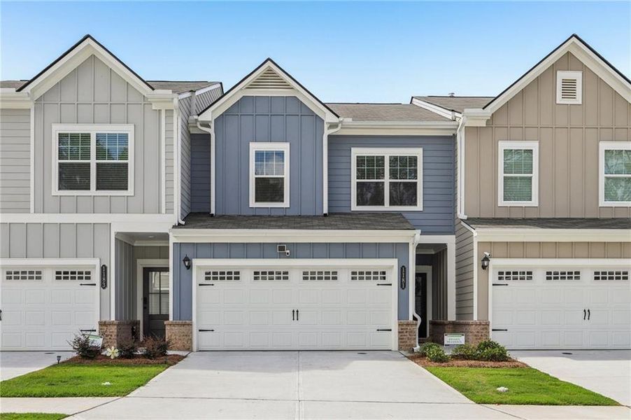 Front exterior of a new home in Ellison Square, Sugar Hill, GA, highlighting curb appeal (Image 2).