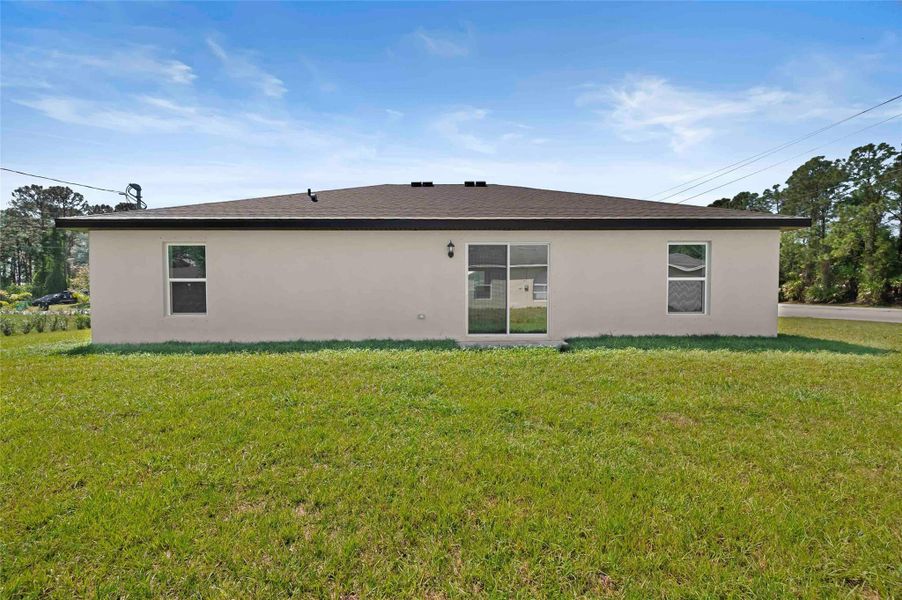 Front exterior of a new home in , Port St. Lucie, FL, highlighting curb appeal (Image 1).