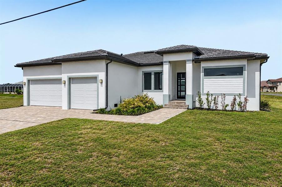 Front exterior of a new home in , Punta Gorda, FL, highlighting curb appeal (Image 26). Front exterior of a new home in , Punta Gorda, FL, highlighting curb appeal (Image 26).