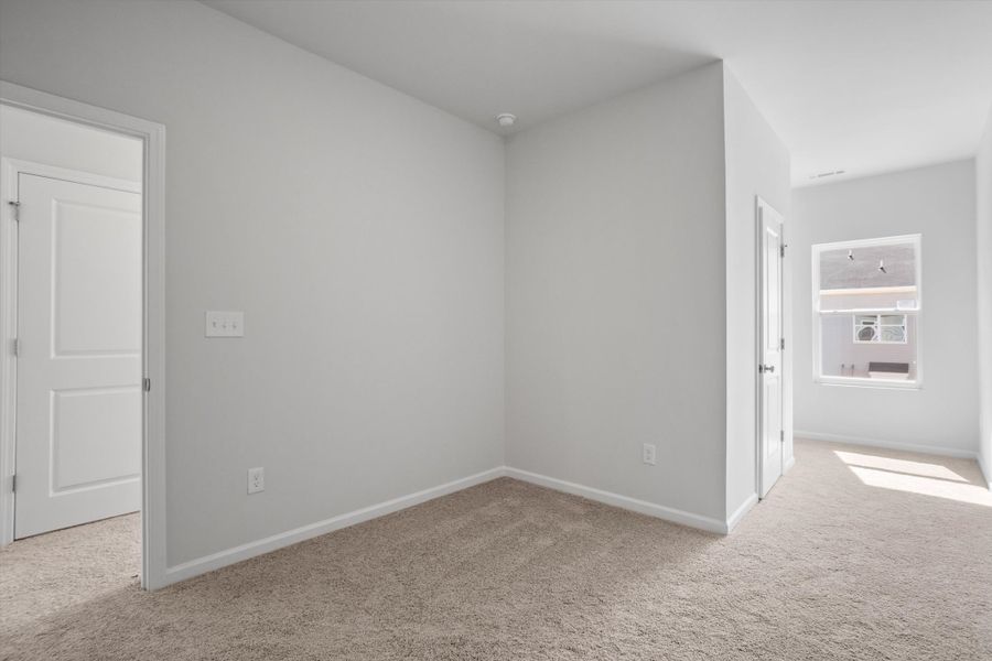 Spacious, unfurnished interior of a new home in Renaissance at White Oak, Garner (Image 25).