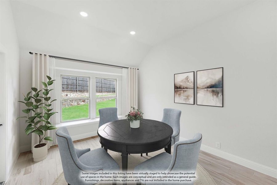 Dining area with round dark wood table, four gray chairs, vaulted ceiling, and hardwood floors near a large window Dining area with round dark wood table, four gray chairs, vaulted ceiling, and hardwood floors near a large window