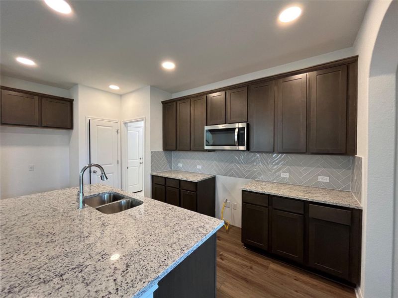 Whirlpool 5 burner gas range, vented microwave and dishwasher Whirlpool 5 burner gas range, vented microwave and dishwasher