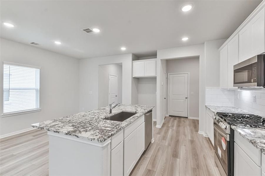 Furnished interior view inside a new home in Lakes at Black Oak, Magnolia (Image 43).