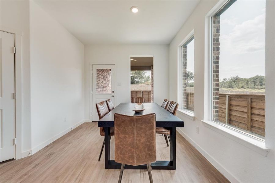 Dining space featuring light wood-type flooring