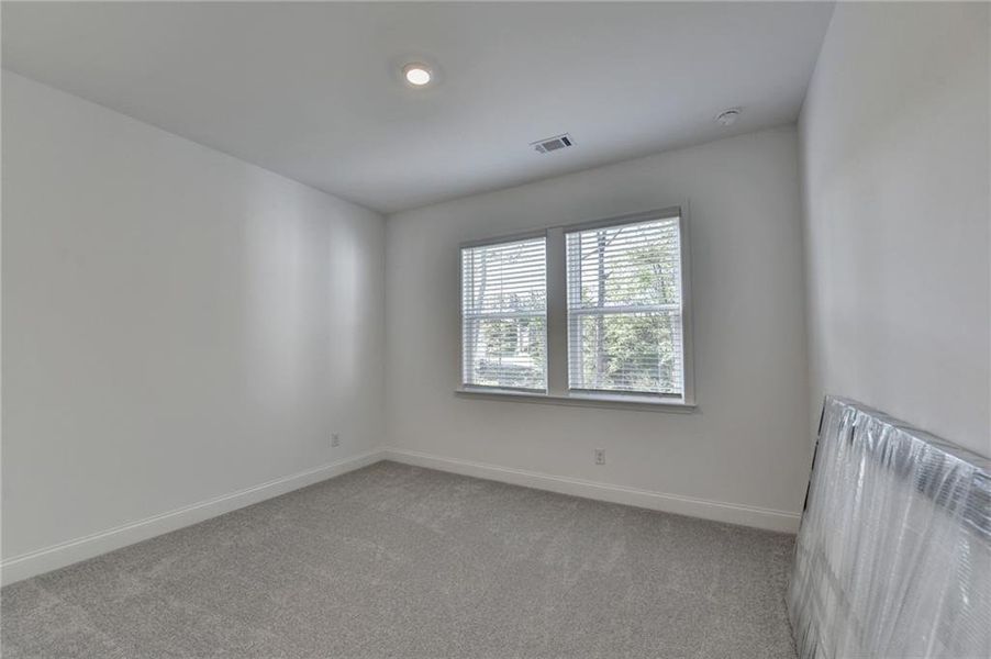 Spacious, unfurnished interior of a new home in Bailey Fence, Dacula (Image 26).