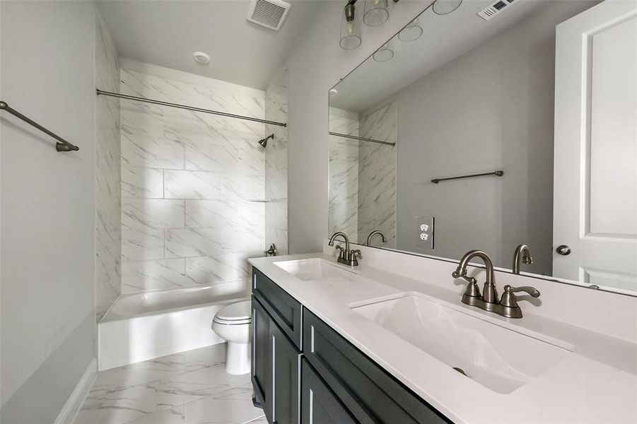 Furnished interior in a model home at Evergreen 55' in Conroe (Image 14).