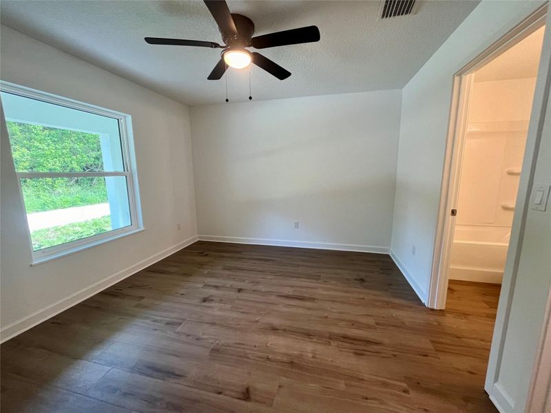 Sizable ensuite master bedroom with walk in closet!