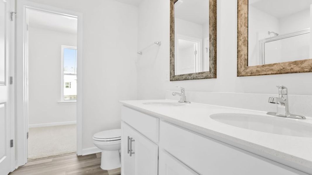 Furnished interior view inside a new home in Village Grove, Greenville (Image 11).