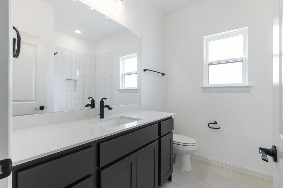 Furnished interior view inside a new home in Lariat - 70', Liberty Hill (Image 15).