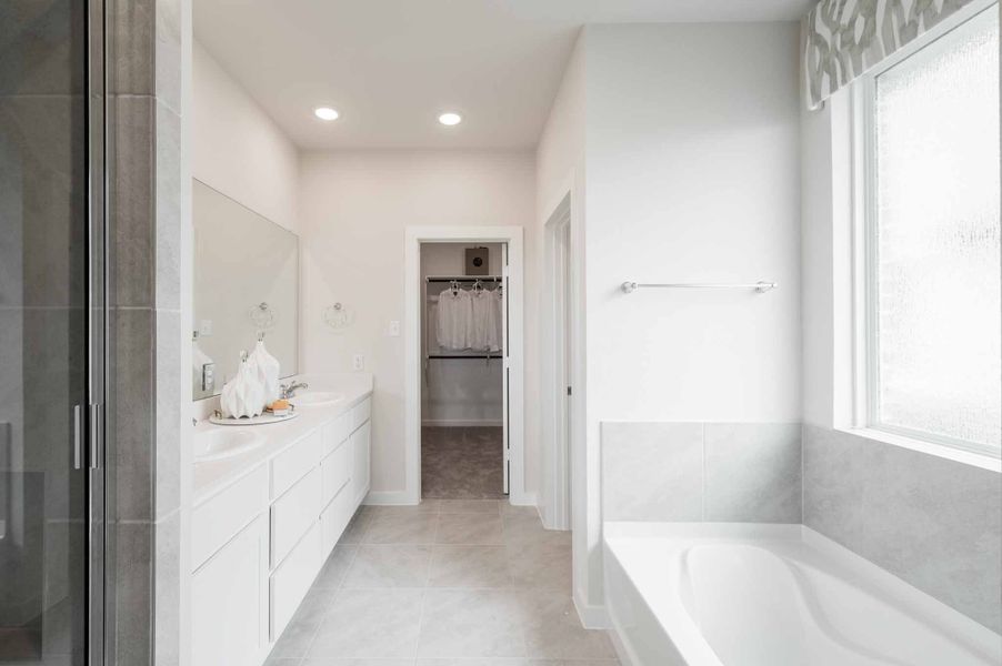 Furnished interior view inside a new home in The Cove at Mason Woods, Cypress (Image 15). Furnished interior view inside a new home in The Cove at Mason Woods, Cypress (Image 15).