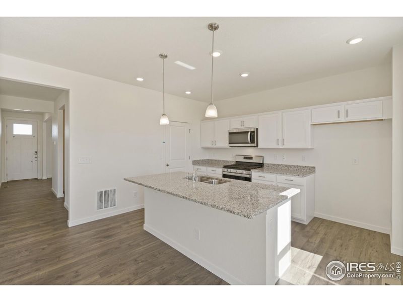 Furnished interior view inside a new home in Westgate, Greeley (Image 6).