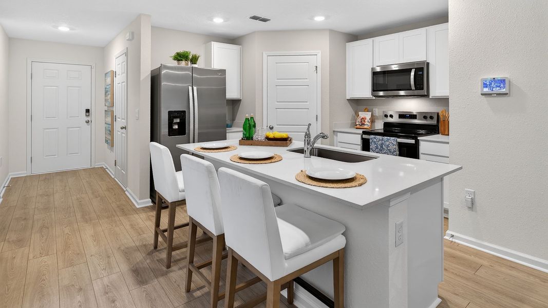 Representative furnished interior of a home built from the Greyson II by D.R. Horton in Irongate Villas, Jacksonville (Image 7).