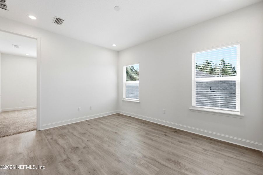 Spacious, unfurnished interior of a new home in Silver Landing At Silverleaf, St. Augustine (Image 31).