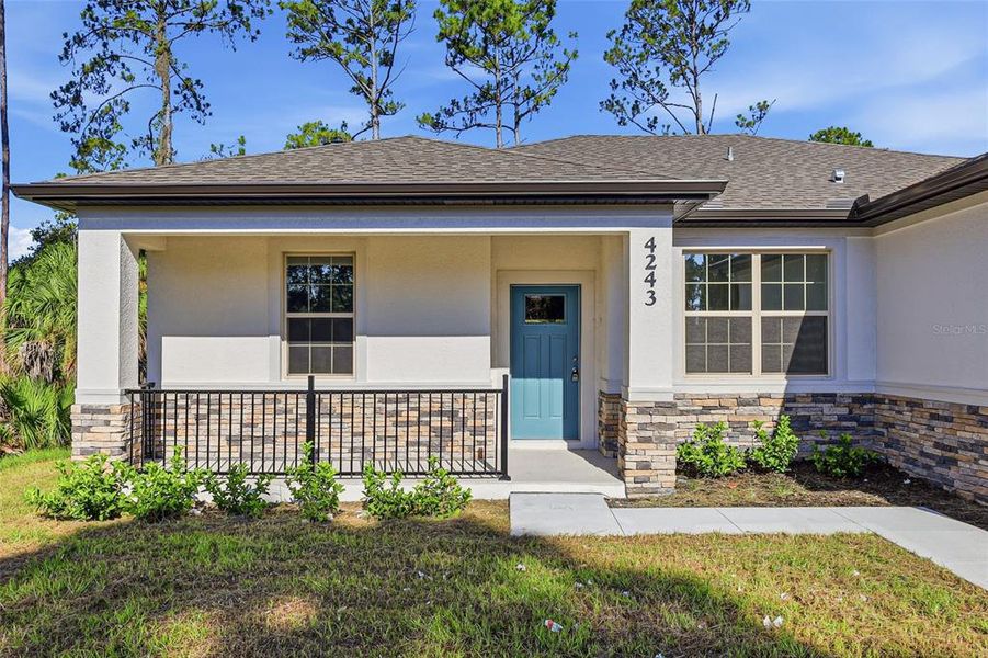 Exterior details and patio area of a home in , North Port (Image 19).