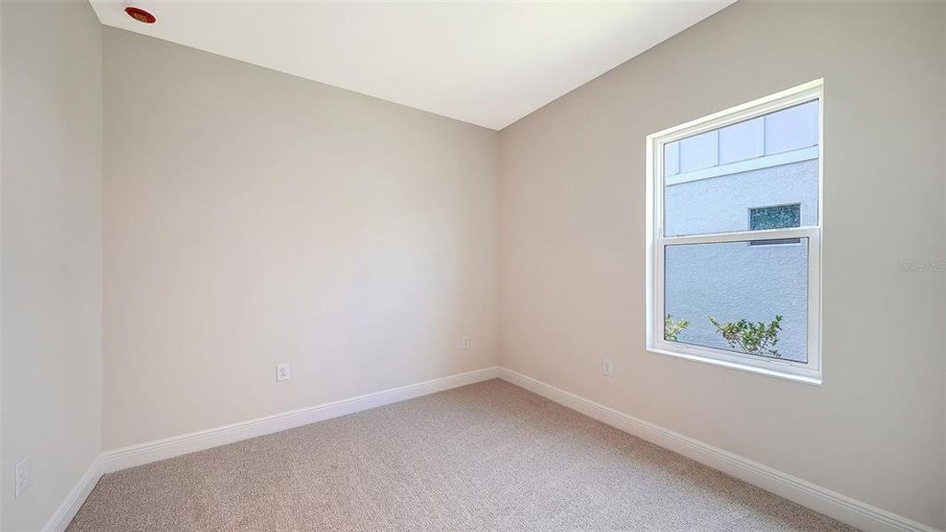 Spacious, unfurnished interior of a new home in Grand Park, Sarasota (Image 29).