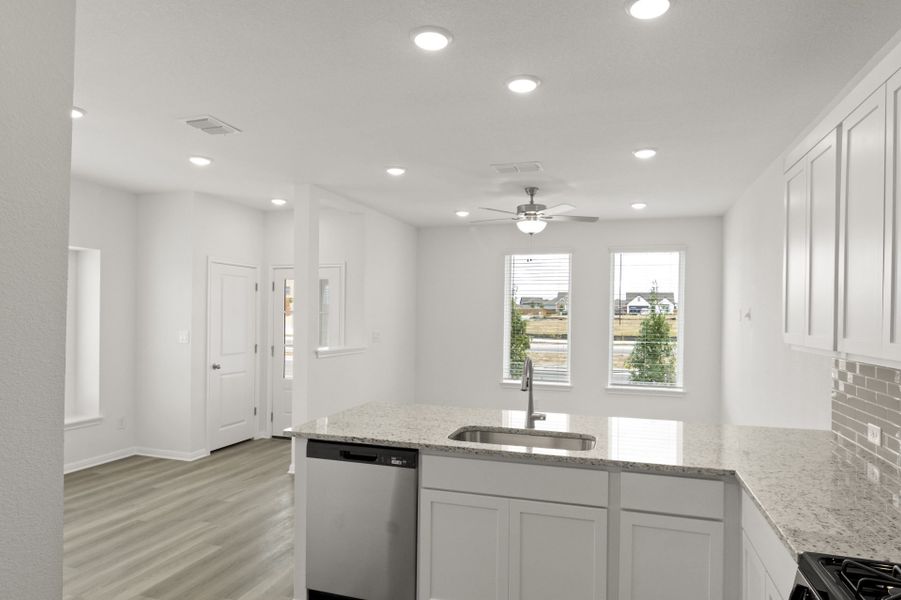 Furnished interior view inside a new home in Trace, San Marcos (Image 18).