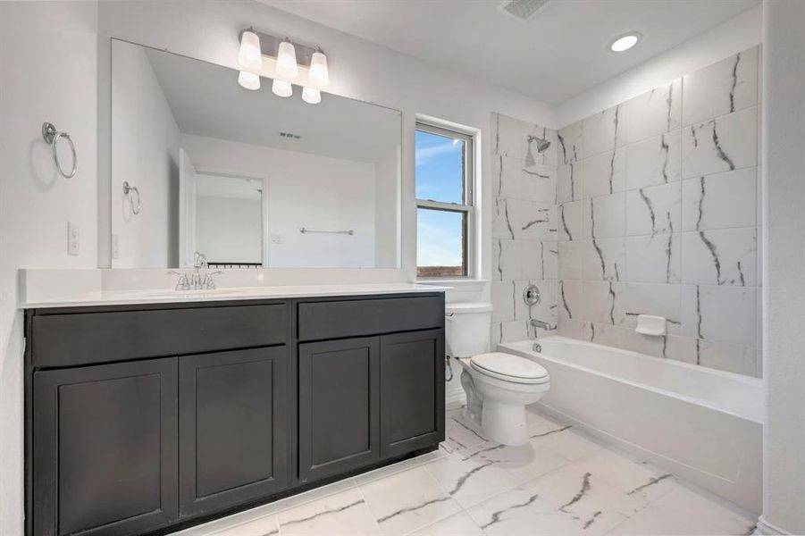 Furnished interior view inside a new home in Lily Creek at Sutton Fields, Aubrey (Image 10).