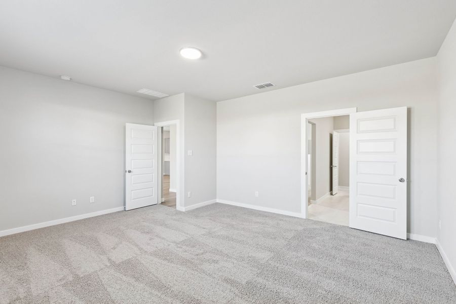Primary Suite in the Haylee home plan by Trophy Signature Homes - REPRESENTATIVE PHOTO