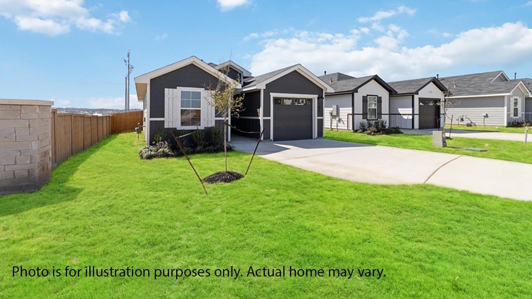 Front exterior of a new home in Marigold, Uhland, TX, highlighting curb appeal (Image 16).
