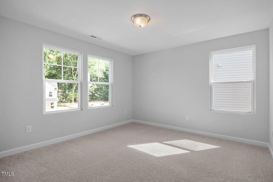 Spacious, unfurnished interior of a new home in Woodland Crossing, Zebulon (Image 25).