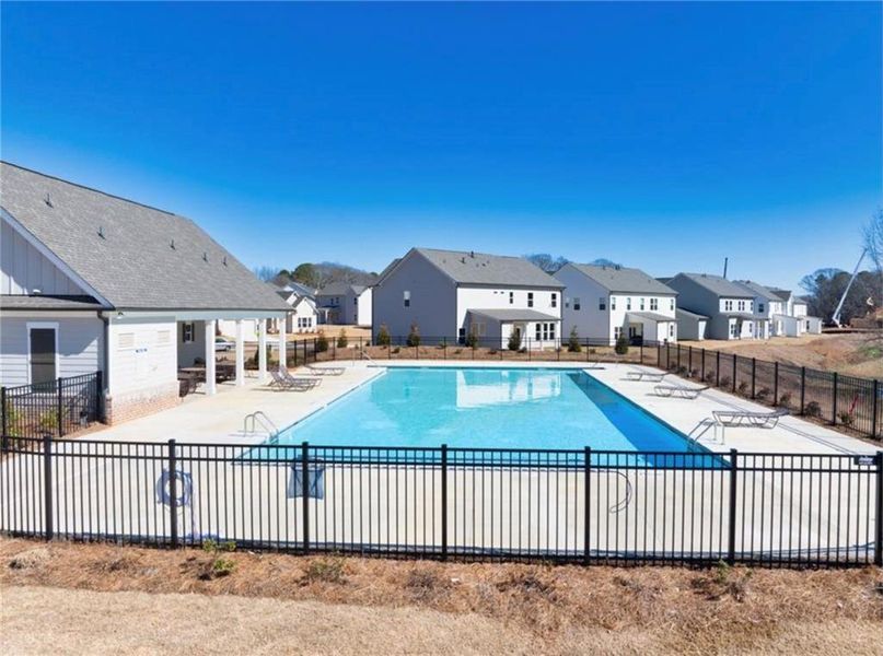 Front exterior of a new home in Rosewood Lake Estates, Hoschton, GA, highlighting curb appeal (Image 1). Front exterior of a new home in Rosewood Lake Estates, Hoschton, GA, highlighting curb appeal (Image 1).