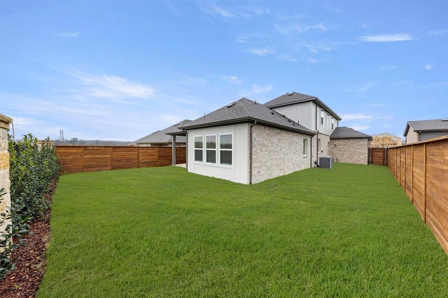 Exterior details and patio area of a home in Solterra, Mesquite (Image 4).