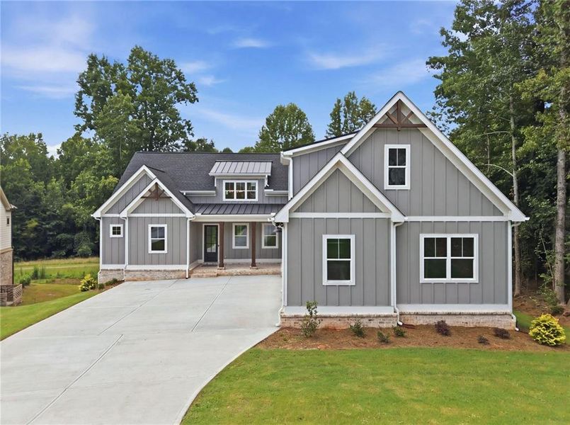Front exterior of a new home in , Jefferson, GA, highlighting curb appeal (Image 27).