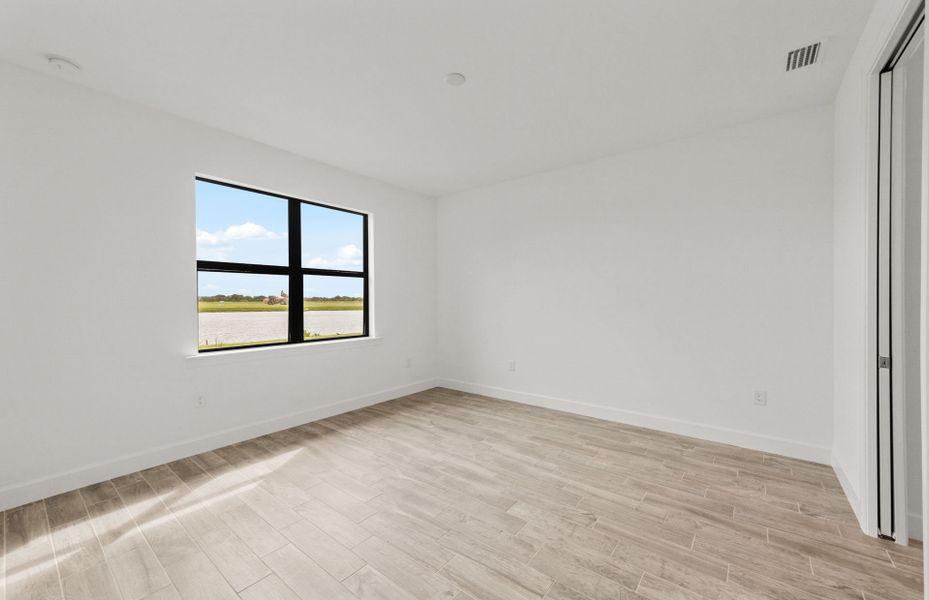 Spacious, unfurnished interior of a new home in Del Webb Naples, Immokalee (Image 13).