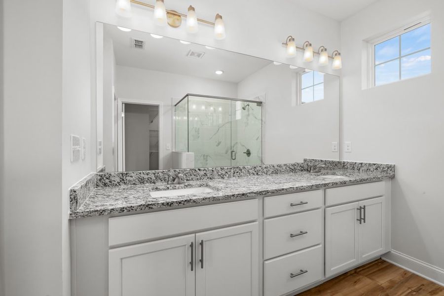 Representative furnished interior of a home built from the Atkinson by UnionMain Homes in Austin Springs, Bethlehem (Image 13).